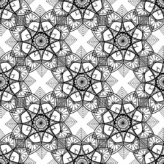 seamless mandala pattern. texture intersecting with each other in a geometric pattern with a circular pattern. seamless pattern of a black mandala line, stylized as a flower on a white background for 
