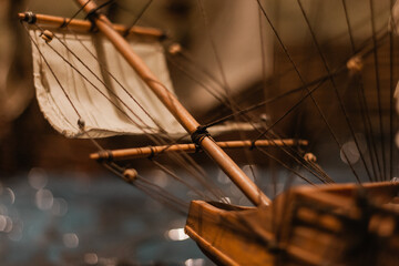 Close-up of Antique Model Sailing Ship with bokeh background