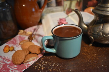 Cup of chocolate with biscuits