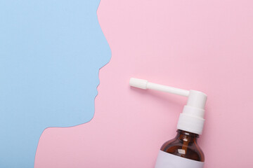 Head silhouette with throat spray on pink background