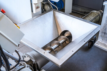 Wine steel grape crusher, equipment of contemporary winemaker factory.
