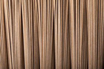 Buckwheat soba noodles background. raw buckwheat paste. Gluten free. Health food. Place to copy.