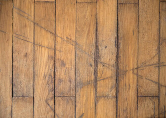 Old oak scratched stripped parquet with remnants of old varnish