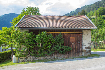 A traditional Austrian horse-barn iin the alpine village of Doelsach, East Tyrol, Austria