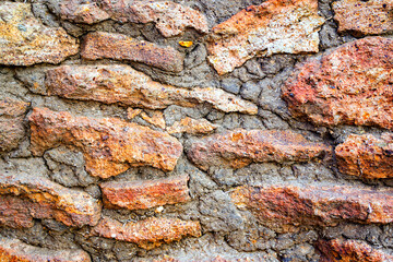 Background of vintage orange stone wall old red texture handmade