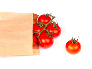 Fresh rape tomatoes on a table. Flat lay