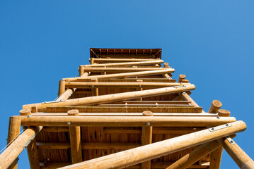 Wooden tower under blue sky