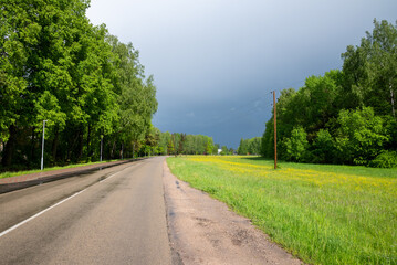 Fototapeta premium Path and road near the river and forest