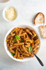 Pasta alla Norma - traditional Italian food with eggplant, tomato, cheese and basil