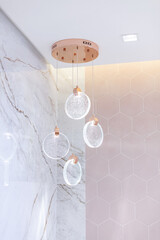Crystal glass pendant chandelier. With a bronze finish.