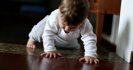 Fototapeta na wymiar Baby crawling climbing home step, infant toddler development growth