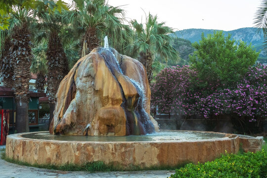 Hot travertine spring at Karahayit in Pamukkale. Natural travertine fountain in Turkey