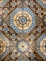 Antique hydraulic tile. Floor made of ceramic.