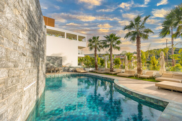 Sea hotel resort with swimming pool in the morning