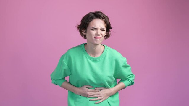 Lady suffer terrible belly ache bacteria isolated pastel color background
