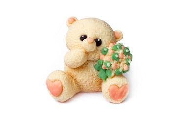 Teddy bear with flowers figurine made of mastic. Sweet decor for a birthday cake. Kids toys. Decor...