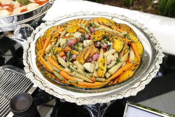 food plate served on metal platter

