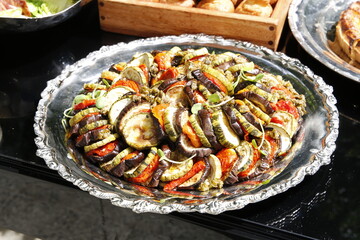 food plate served on metal platter
