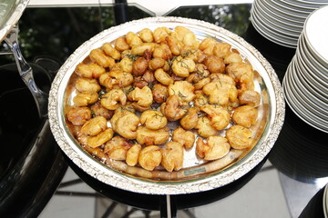 food plate served on metal platter
