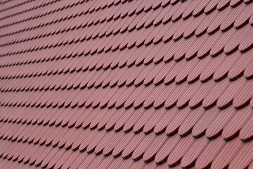 A brown tile roof with selective focus