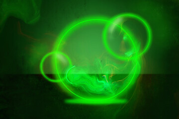 Neon Green. Futuristic style circle. Glowing green neon futuristic style on dark background with dust particles and light beams.Background with vivid colors with copy space.