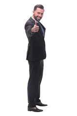 full length . successful businessman showing thumbs up