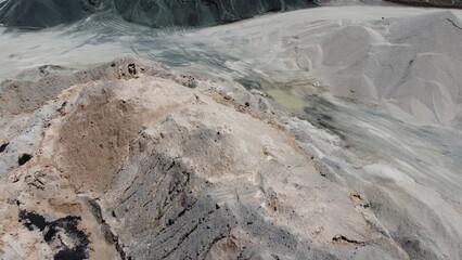 An aerial view of the piles of fine stone in the quarry. Fine stone is used in the production of quality asphalt for roads and for the preparation of concrete used in construction