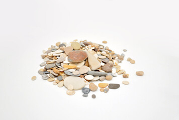 rounded gravel on a white background, isolated sea beach pebbles