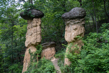Stone towers in the Riserva naturale dei "Ciciu del Villar " - National Park in Cuneo Province - Piedmont, Italy. Rare geological phenomenon