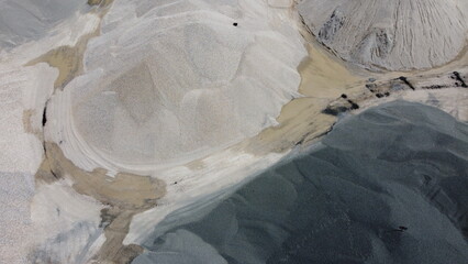An aerial view of the piles of fine stone in the quarry. Fine stone is used in the production of quality asphalt for roads and for the preparation of concrete used in construction