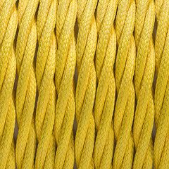 Colorful braided and shilded cable texture background. Closeup with visible texture