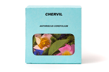 Obraz premium Chervil Medicinal herbs in a cardboard box. Herbal tea in a gift box