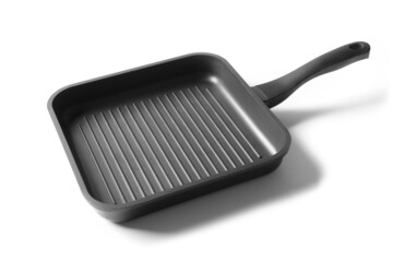 Empty cast iron grill pan with handle isolated on white background. Side view