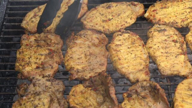 Spicy Pork Beef Bacon Being Grilled Over Bright Glowing Coals Broasting On Fire. Lunch celebration Party Barbecue. Outdoor Cooking. Cook Prepares Oriental Dish In Kitchen. Junk Food, Healthy Lifestyle