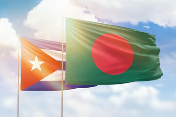 Sunny blue sky and flags of bangladesh and cuba