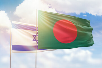 Sunny blue sky and flags of bangladesh and israel