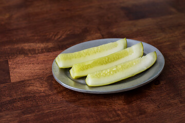 Dill Pickle Spears on a Plate