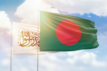 Sunny blue sky and flags of bangladesh and afghanistan