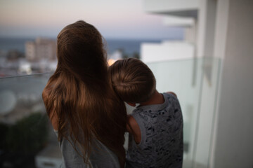 Family portrait, white boy and girl, sister and brother stay, watch, dream, hug.