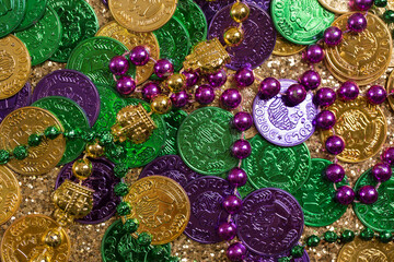 Mardi Gras Decoration on a Gold Glitter Background