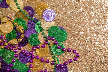 Mardi Gras Decoration on a Gold Glitter Background © Jennifer