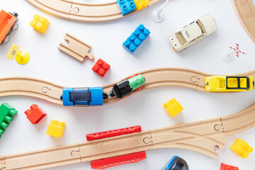 Small toys on bright background