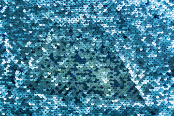 Colorful sequins sparkling background. Texture of sequins.