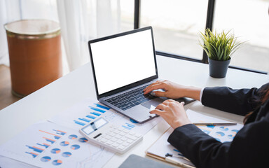 Blank white screen laptop, Woman working at office hand on keyboard close up.