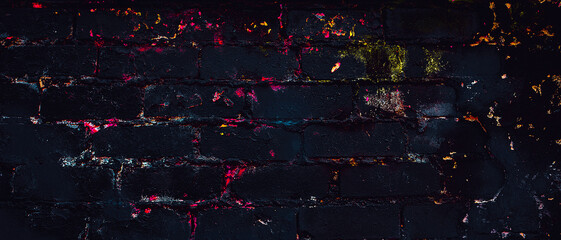 Dark brick. Black texture. Stone background. Dark marble. Rock texture. Rock surface with cracks. Rock pile. Paint spots wall. Grunge Rough structure. Abstract texture.