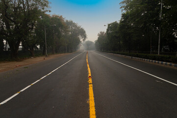 A deserted city road of kolkata city under lockdown due to corona virus. Kolkata is the capital...