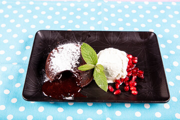 Soufflé dessert souffle. Top view of the baked liquid chocolate soufflé. Liquid Chocolate Cake...