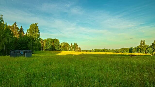Vibrant day to night 24h time-lapse. Time passes in nature. Sunrise clouds.