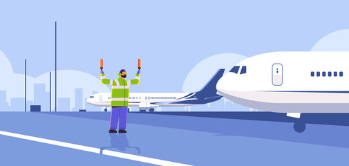 aviation marshaller supervisor near aircraft air traffic controller airline worker in signal vest professional airport staff