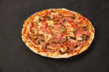 Pizza with ham, cheese and mushrooms